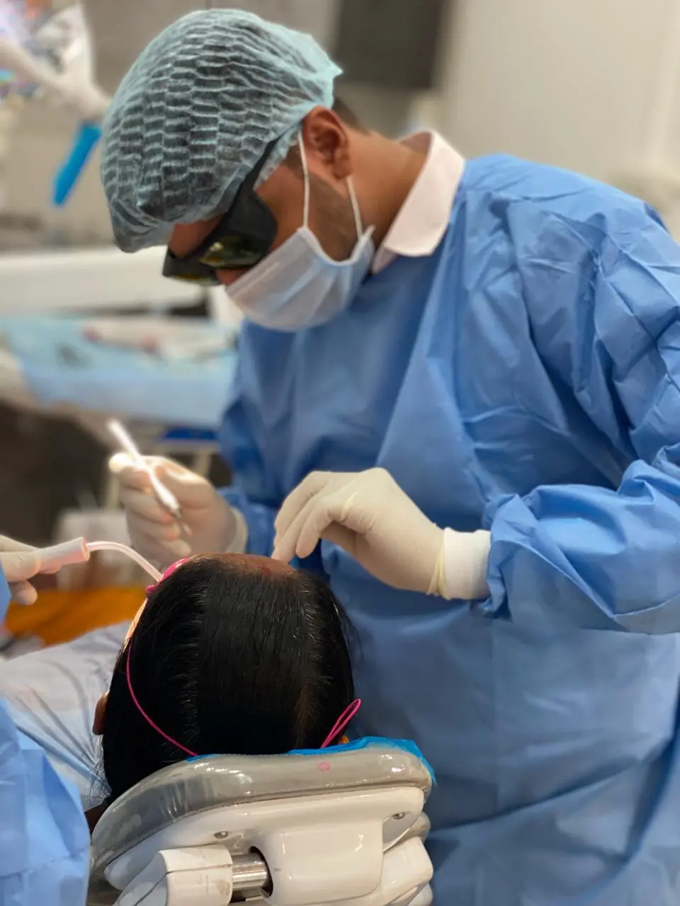 Dr. Garv Chaudhari performing surgery
